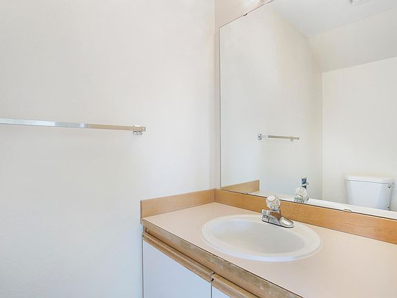 mirror image of half bath in unit A