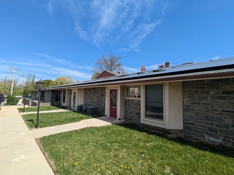 Exterior View of Apartment with Front Yard