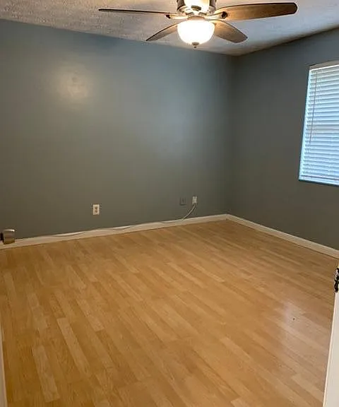 Master bedroom new fan with remote, large closet, wood laminate flooring