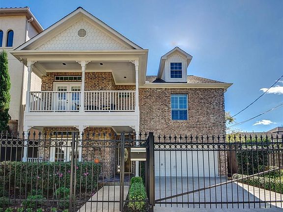 Beautiful 4 Bedroom 3.5 Bath Home in Rice Military with a 2 Car Garage & Automatic Gate