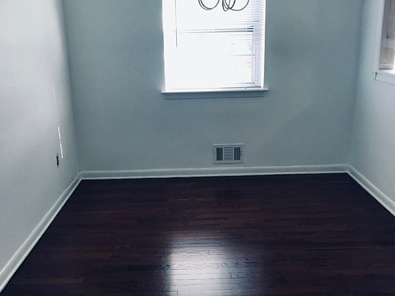 Dining room refinished hardwood floors