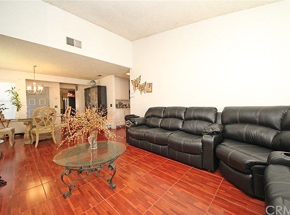 Vaulted ceiling, tile flooring