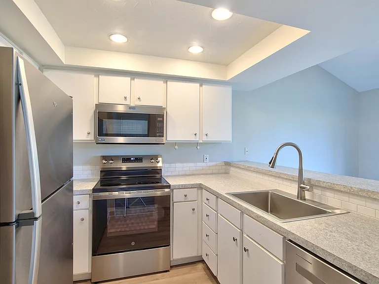 Fresh paint, new countertops, and new appliances!