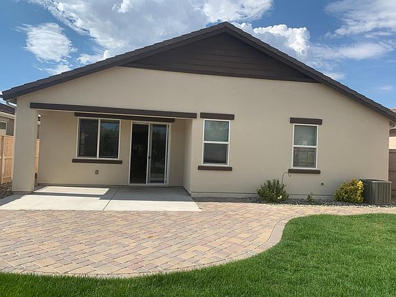 rear of house with covered patio