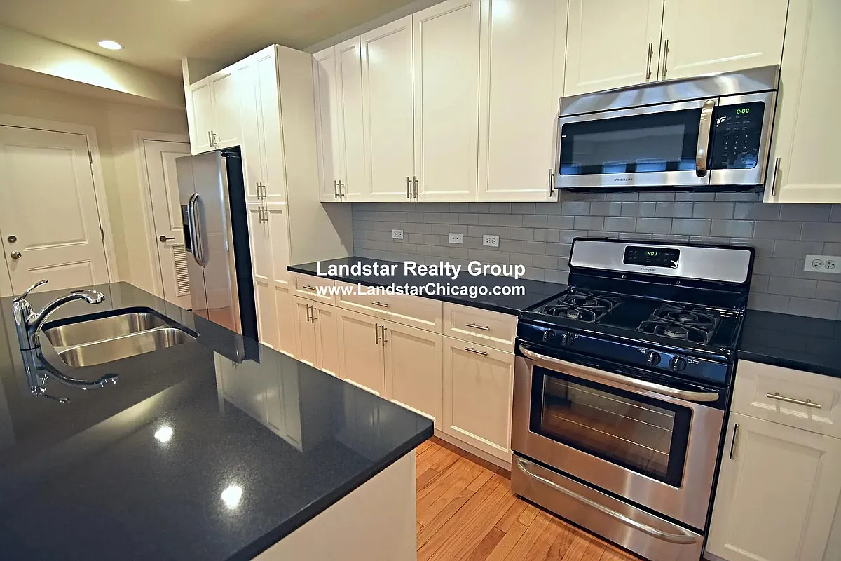 Building Photo - 6455 N Newgard Ave #2