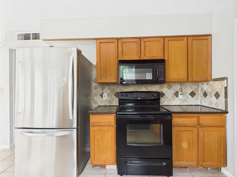 9520 Quail Village Ln — Photo 20