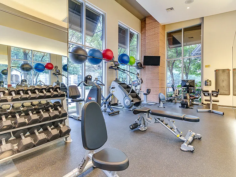 Premier fitness center with weight training area