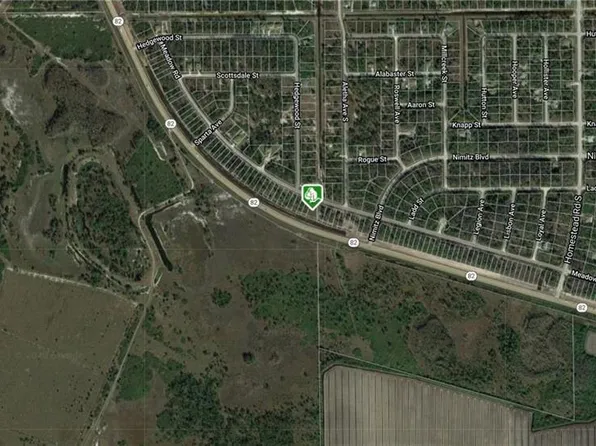 2548 Meadow RD, LEHIGH ACRES, FL 33974