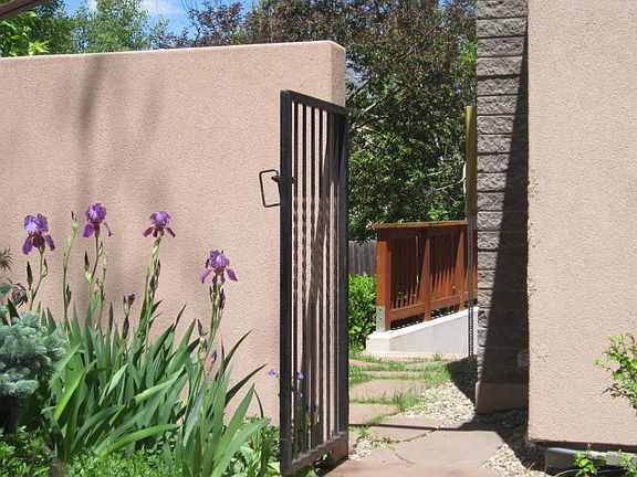 Gate to basement and veggie garden