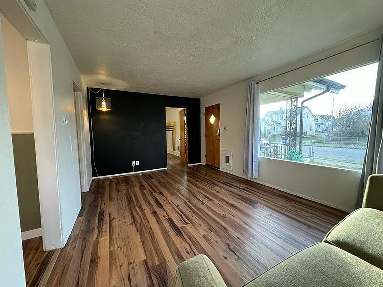 Living room with large picture window.