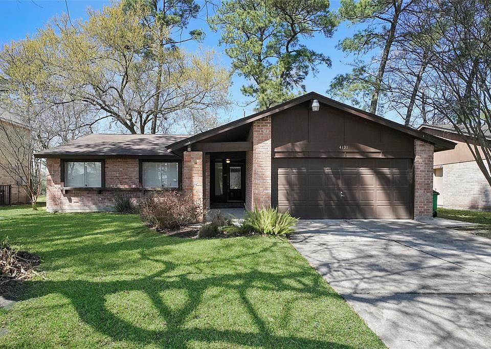 Welcome to 4131 Wyanngate Dr. Lot is wooded. Double wide driveway provides you with plenty of space for parking cars and for guests. 2 car garage.