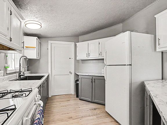 4th image of 6082 E V Ave