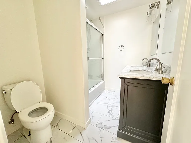 Second bathroom with full bath