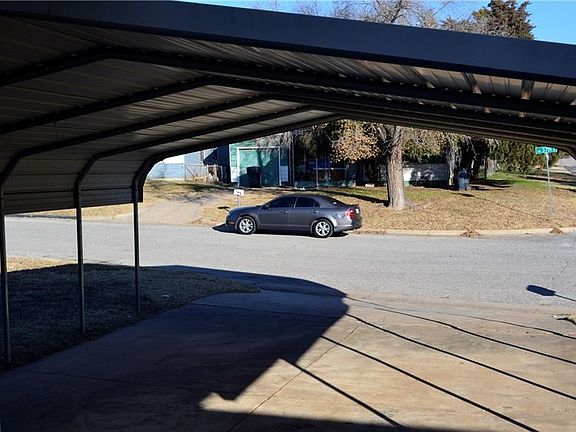 2 car carport gives you extra protection from those hail storms.