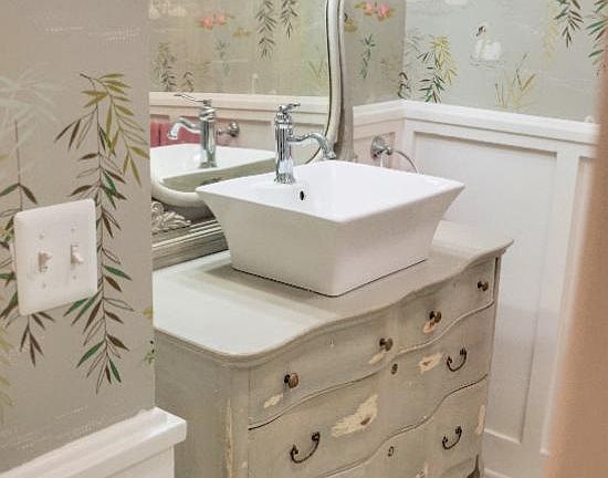 Bathroom vanity. Special wallpaper.