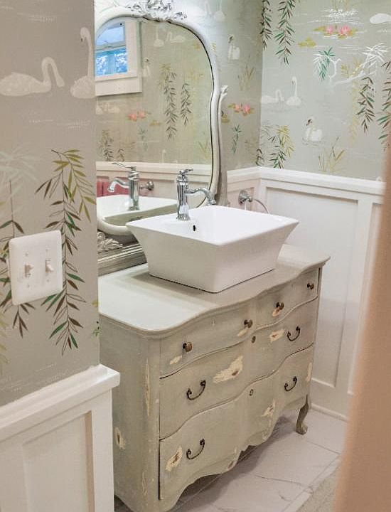 Bathroom vanity. Special wallpaper.