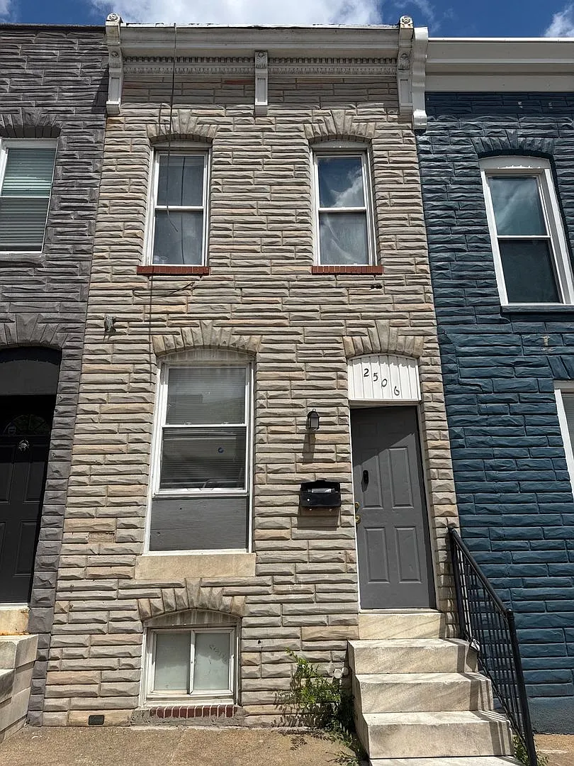 Charming Baltimore Townhouse with Exposed Brick & Modern Upgrades — Photo 1