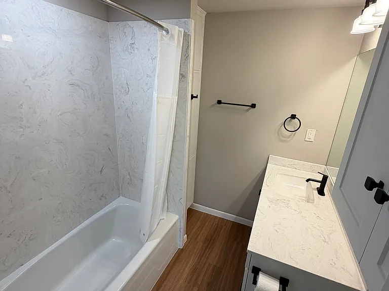 Balmorhea bath has all new cultured marble surround and countertop, new fixtures, plumbing and electrical. Massive amount of cabinets in this one.