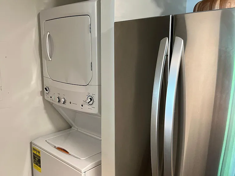 New stackable washer and dryer and refrigerator included