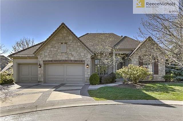 Amazing curb appeal with stone accent and title roof