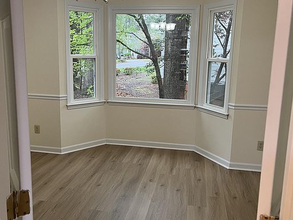 dining room with bay window