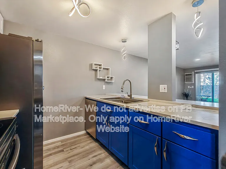 6017 E 6th Ave #M104 — Photo 2