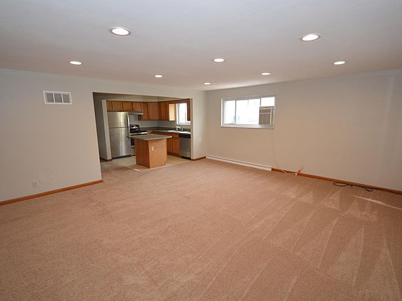 Open concept, Newly renovated living room. Fresh paint, new