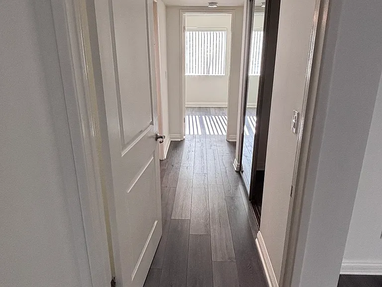 Hallway to Bedrooms, Bathrooms, Guest Closet