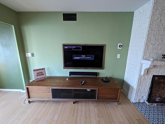 Entertainment center with flat panel Samsung 55" TV and Sonos soundbar