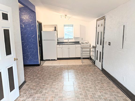 Pic taken standing at living room window, the door on the right is the entry door and balcony with keypad entry