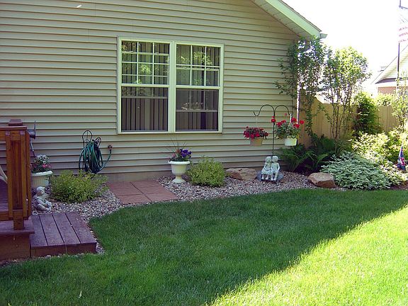 newer landscaping plus rear and front faucets