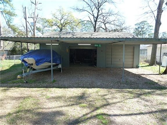 3 car garage,3 car carport. & plenty of parking!!
