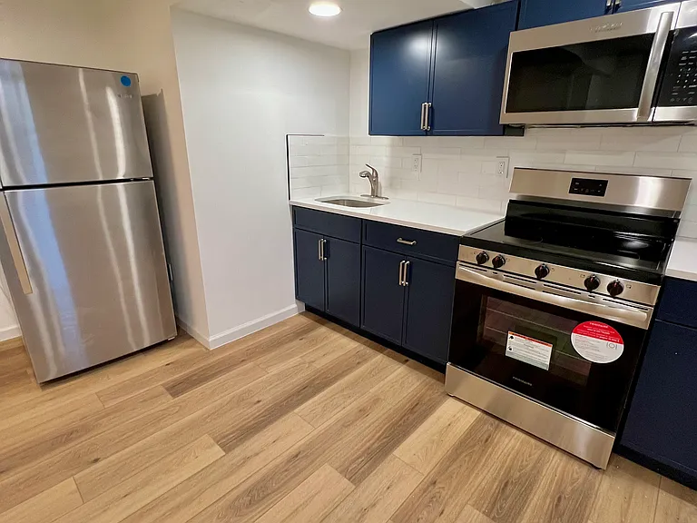 Kitchen with marble & granite tile