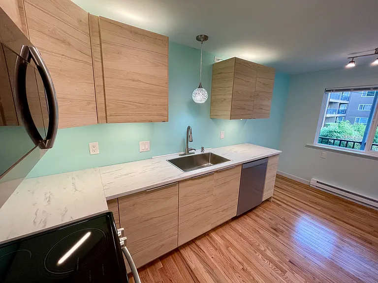 Apt 6 kitchen (pic from before backsplash was installed.)