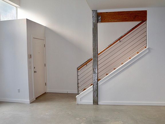 Entry with Brushed Steel and Rail