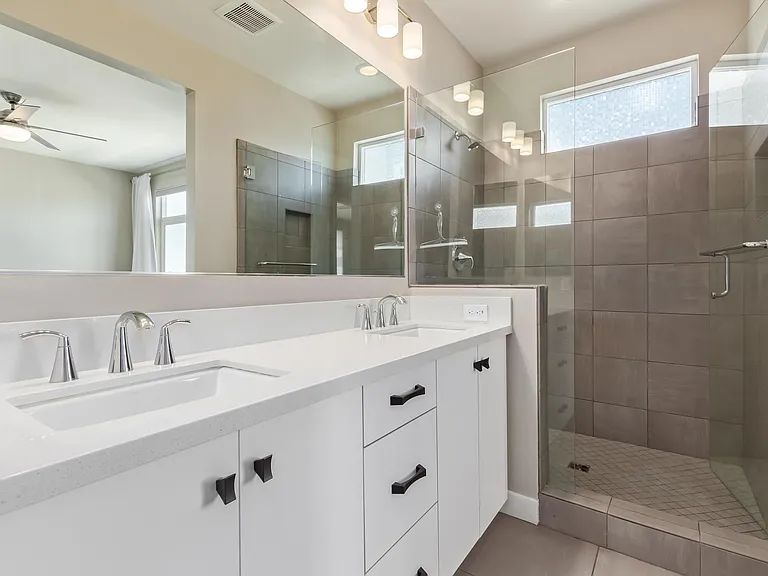 Every bedroom has a private, attached bath PLUS home has additional half bath for guests!