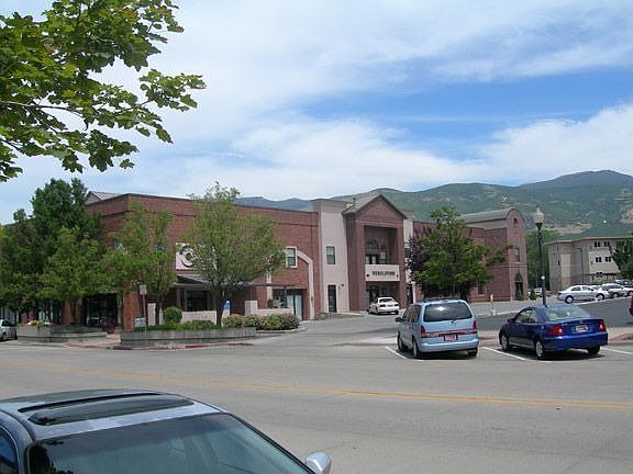 The condo is located in the center of the building (arch).