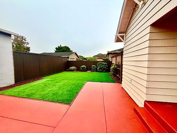 The rear yard boasts a sizeable astro-turf lawn, allowing tenants to enjoy the benefits of real grass without the cost and hassle of maintenance.