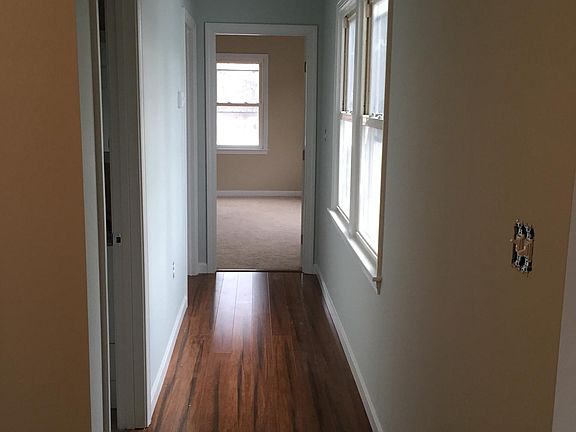 Hardwood floors in living room, kitchen and dining room.
