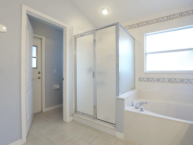 Master Bathroom and leads out to pool