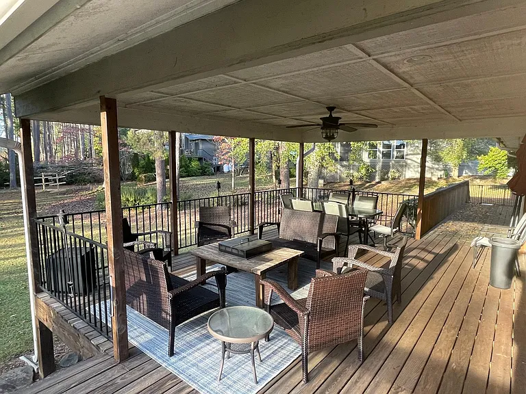 Back deck seating area with gas fire pit table