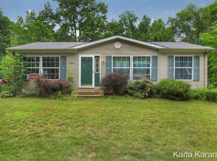 8827 Oak Dr, Sand Lake, MI 49343