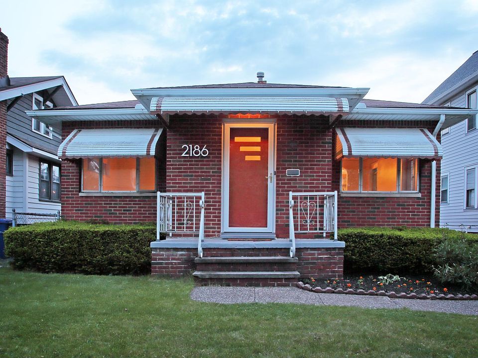Complete update of original door, replacement of storm door, and new address numbers.