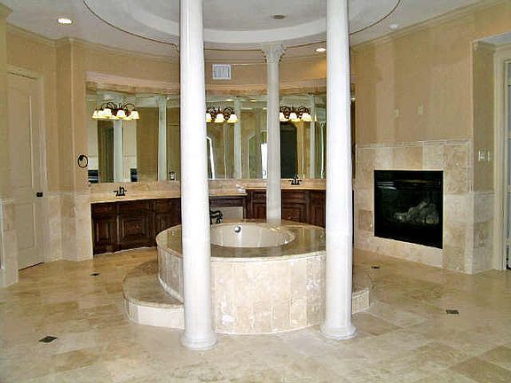  Master bathroom with marble floors, granite counters, walk in shower, sauna, and HUGE master closets. 