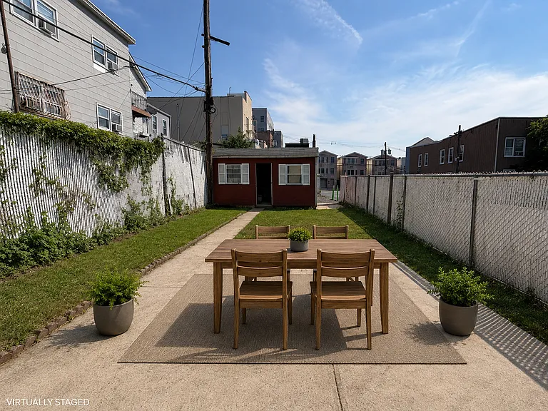 Virtually staged - storage shed NOT included