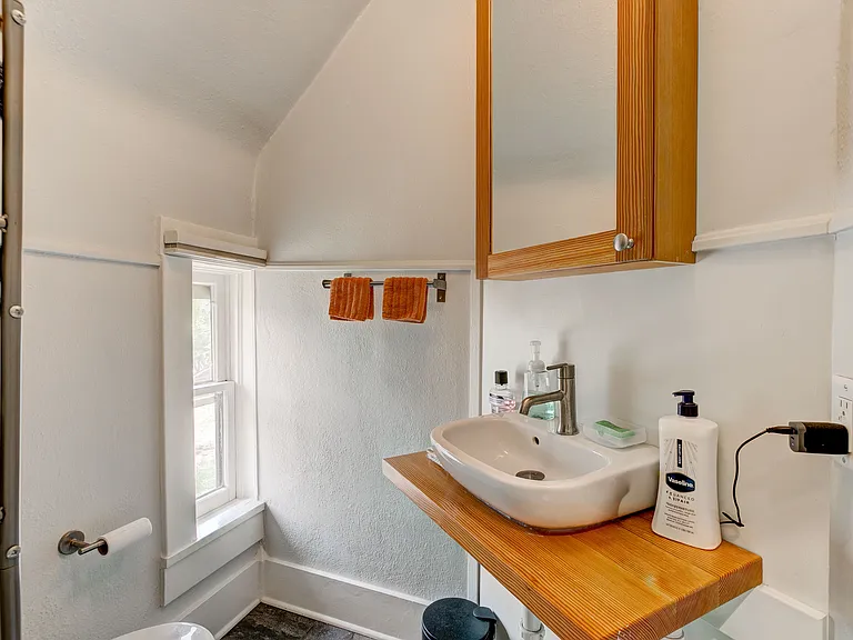 bathroom sink and medicine cabinet