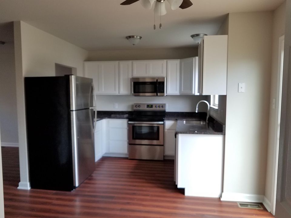 Newly renovated kitchen with granite countertop, stainless s