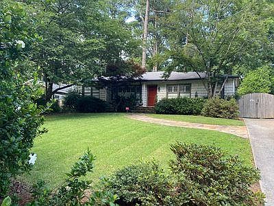 Charming curb-appeal with street semi-privacy