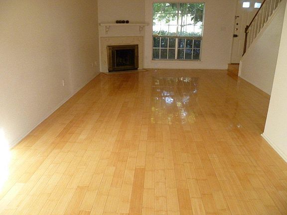 Living room Bamboo Flooring and Great Natural Light from Both Sides of the Home!