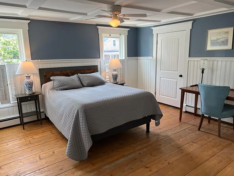Bedroom #3 with Dreamcloud Queen Bed, half bathroom and desk